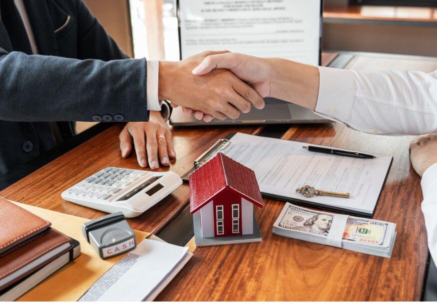 Good deal! Two business partners shaking hands after signing contract, client satisfied of getting loan insuring life handshaking with banker, happy job applicant appreciating hr for receiving place